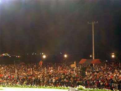 A crowd raving with cries of 'Praise the Lord!'