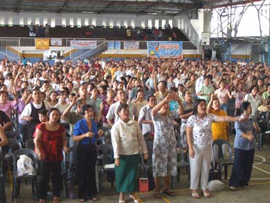 Singing praise songs to the Lord, as the Charismatic Youth Band played on