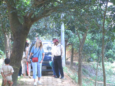 Walking to the crossing point and boarding the boat to Kulun Village