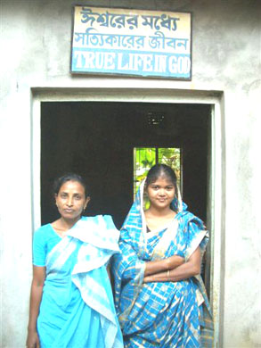 Villagers and school teachers watching the 