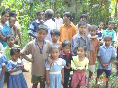 Villagers and school teachers watching the 