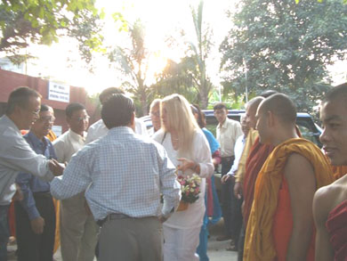 The Buddhist monks, the directors of the Orphanage and some of the 400 children were on hand to greet us with flowers and songs 